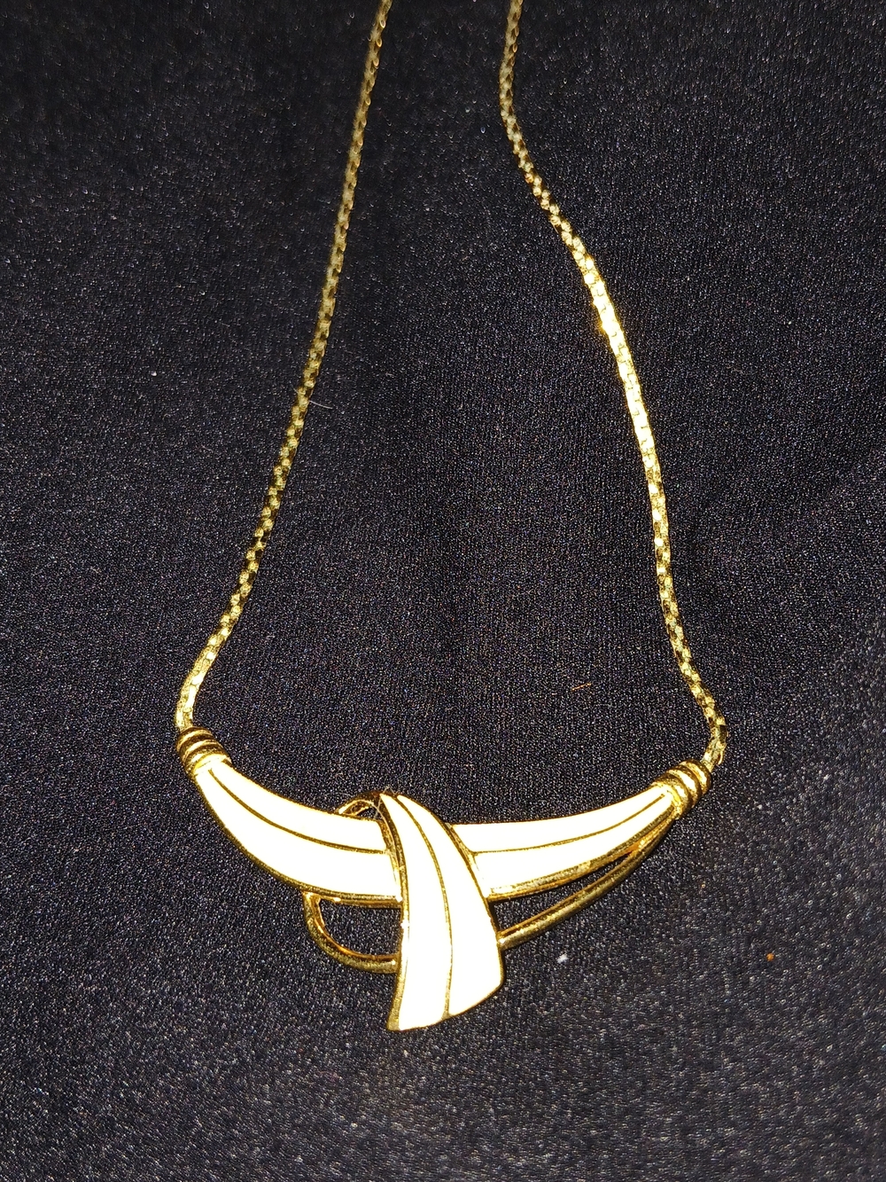 Trifari Vintage Gold-Tone Necklace with White Enamel Knot Accent